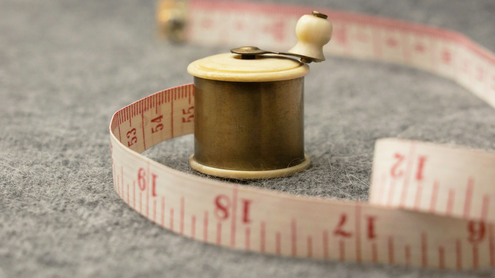 Measurements for bespoke dresses are taken to ensure a perfect fit.